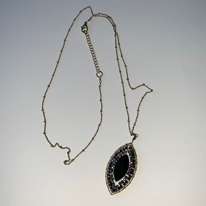 Drop pendant beaded necklace with adjustable clasp for length.